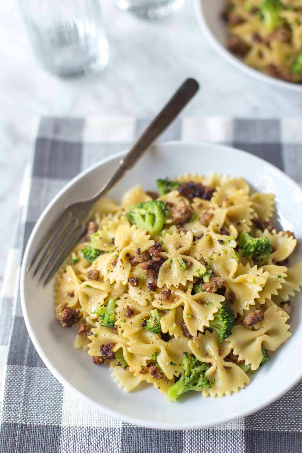 overhead view of italian sausage pasta with broccoli