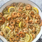 old bay shrimp scampi pasta recipe in a large white skillet