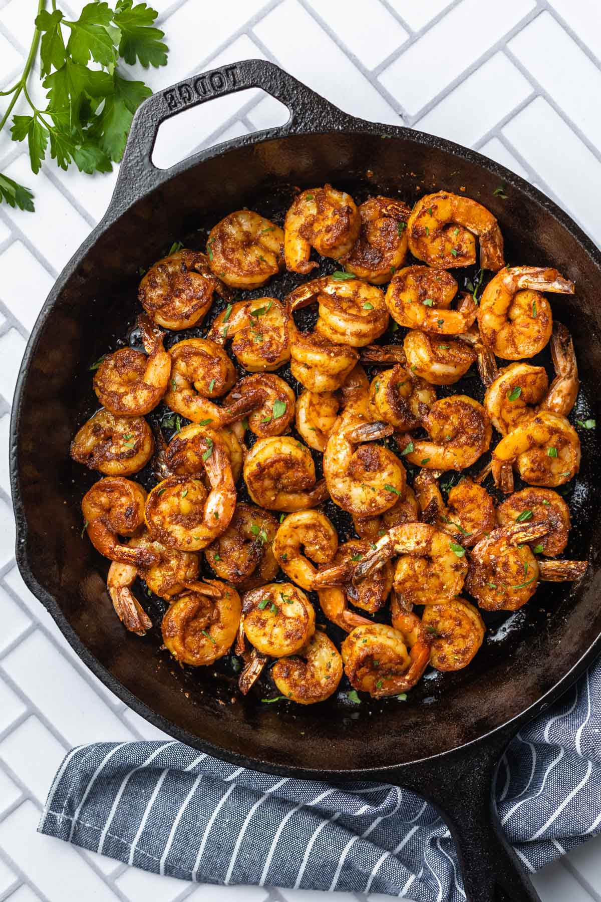 sweet and spicy shrimp in a cast iron skillet