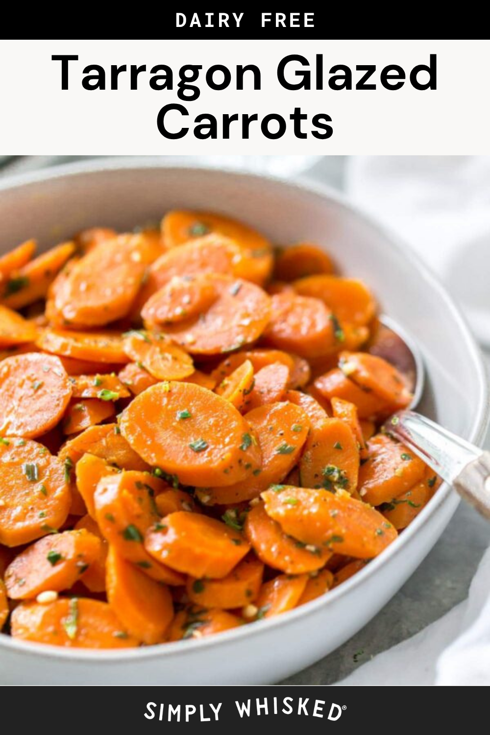 A white bowl filled with tarragon glazed carrots, sliced and coated in a glossy glaze, is garnished with fresh herbs. A silver spoon rests in the bowl. The text reads Tarragon Glazed Carrots and Dairy Free at the top.