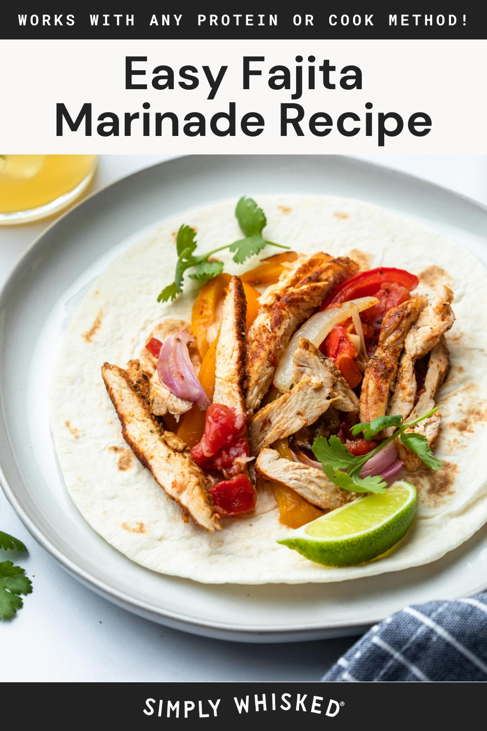 A tortilla topped with sliced grilled chicken, sautéed peppers, onions, tomatoes, cilantro, and a lime wedge on a white plate. Text above reads: Easy Fajita Marinade Recipe for flavorful chicken fajitas.