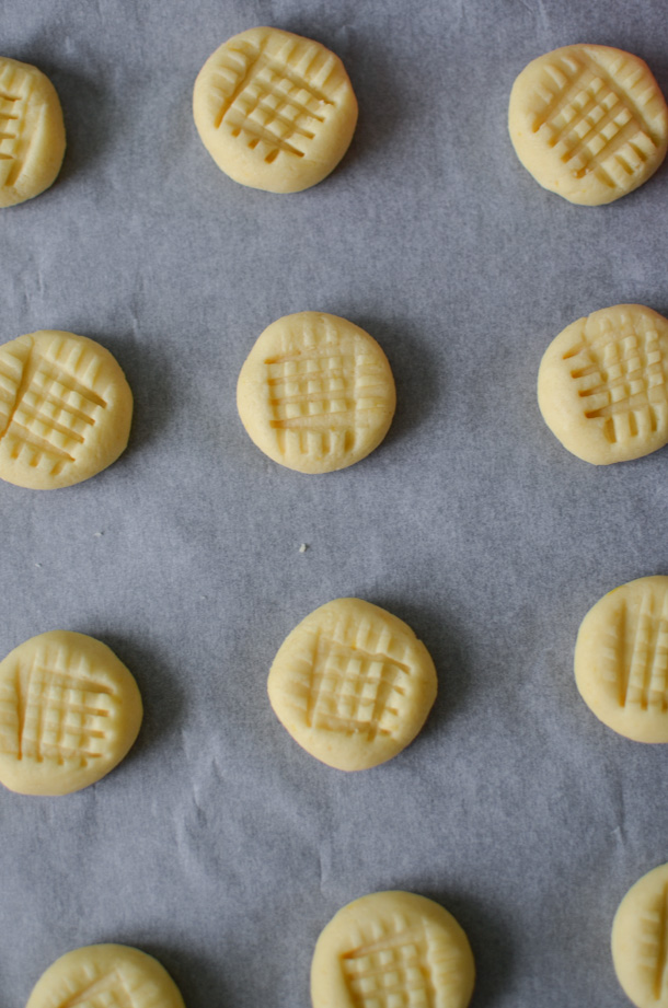 lemon butter cookies recipe before being baked on a cookie sheet lined with parchment