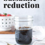 balsamic reduction (balsamic glaze) in a mason jar with a spoon to the side (with text overlay for Pinterest)