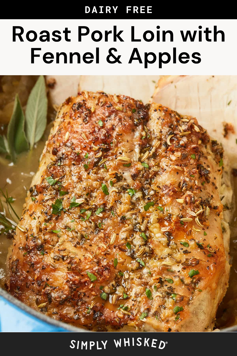 A golden-brown roast pork loin with fennel, topped with aromatic seeds and herbs, sits in a pan alongside apple slices and fresh bay leaves. Text above reads Roast Pork Loin with Fennel & Apples.