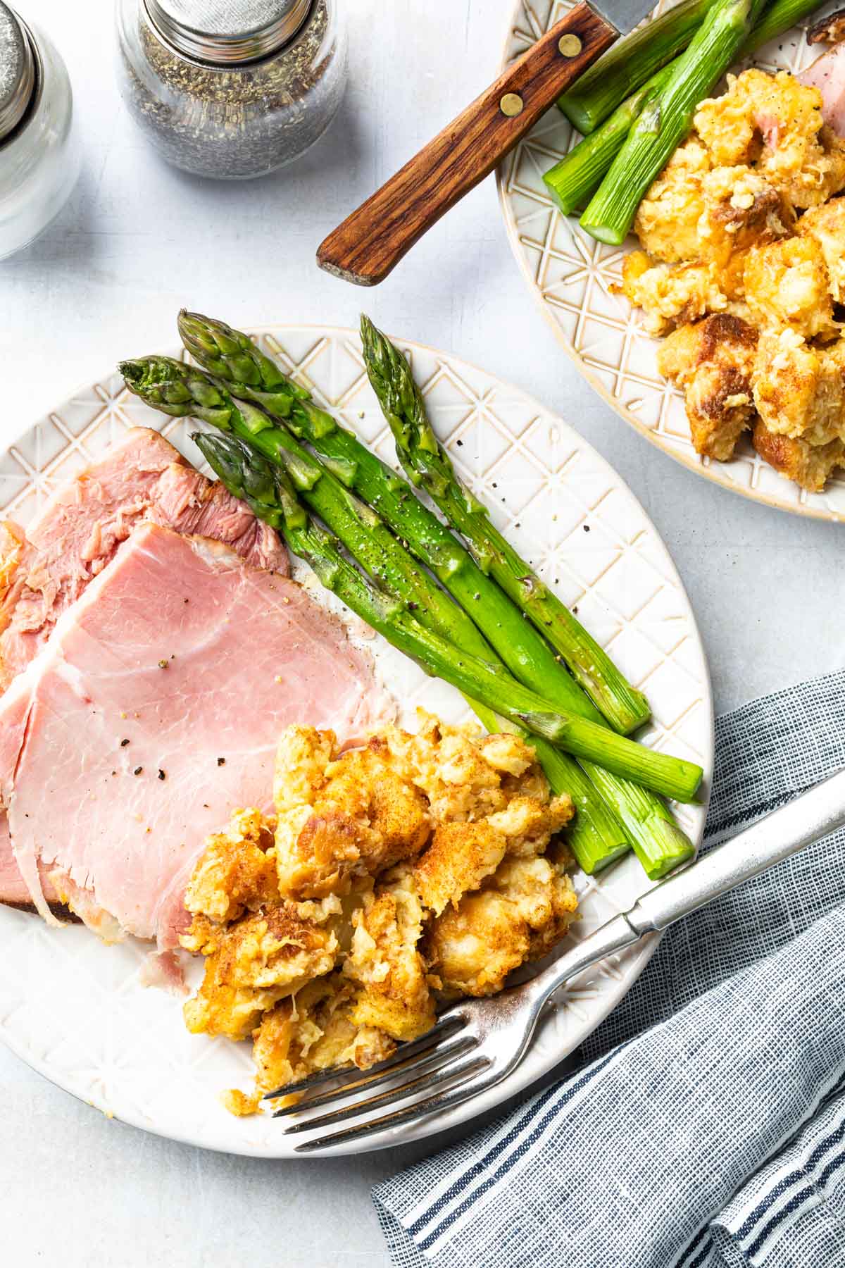 A plate of ham, asparagus and pineapple stuffing. 