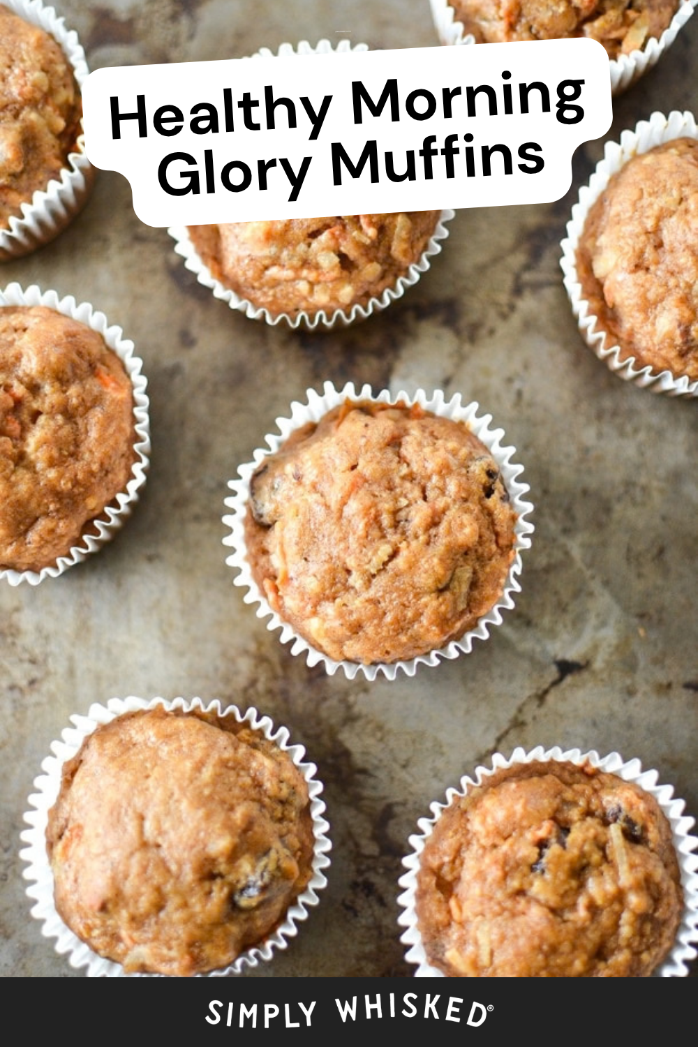 Eight golden-brown healthy morning glory muffins in white paper liners are arranged on a baking tray. Text at the top reads Healthy Morning Glory Muffins. The Simply Whisked logo appears at the bottom.