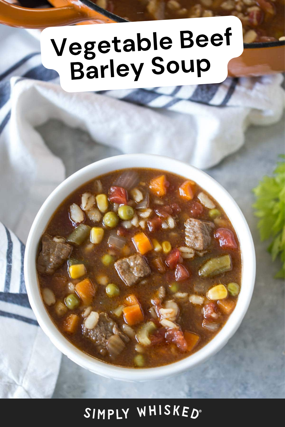 A bowl of hearty beef barley soup, brimming with chunks of beef, barley, peas, corn, and carrots, sits invitingly on a table. In the background, a pot of soup and a striped cloth complete the cozy scene. Text reads Vegetable Beef Barley Soup.