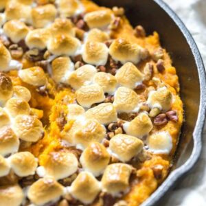 Sweet potato casserole in a cast iron skillet.