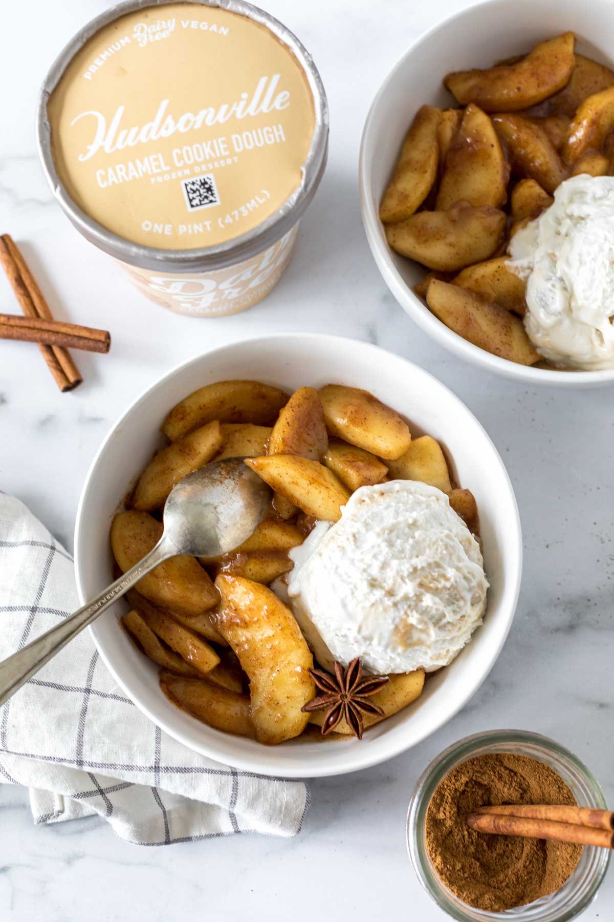 fried cinnamon apples topped with dairy free ice cream