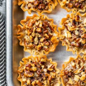 mini pecan pies after being baked in the oven