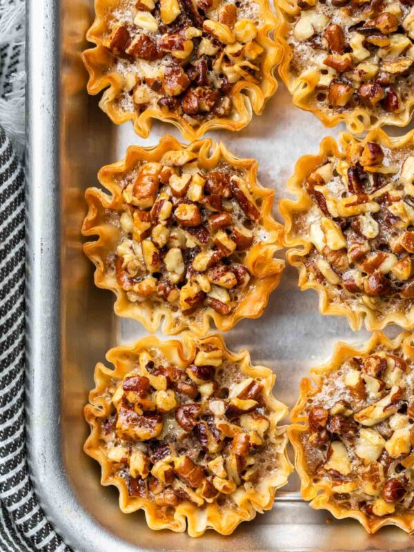 mini pecan pies after being baked in the oven
