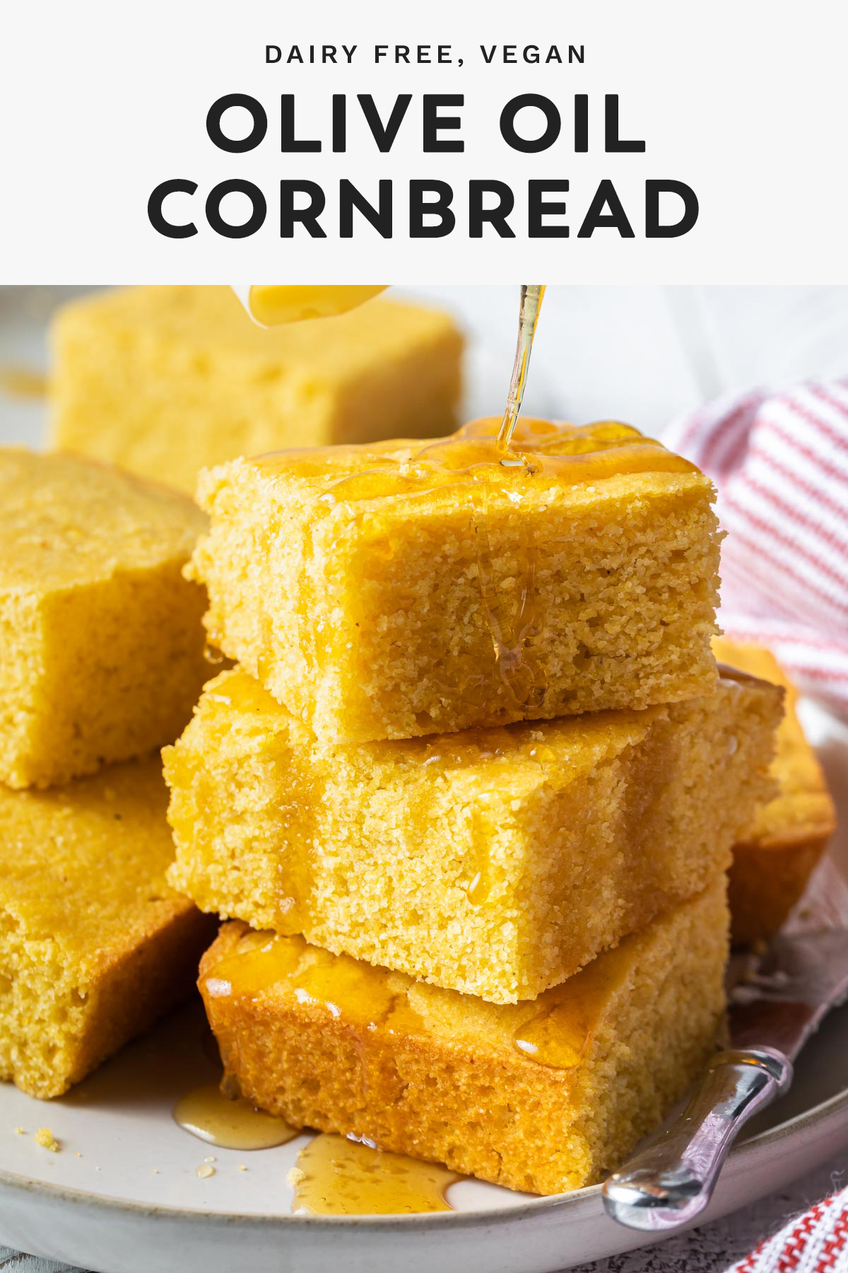 Cornbread stacked on a plate drizzled with vegan honey