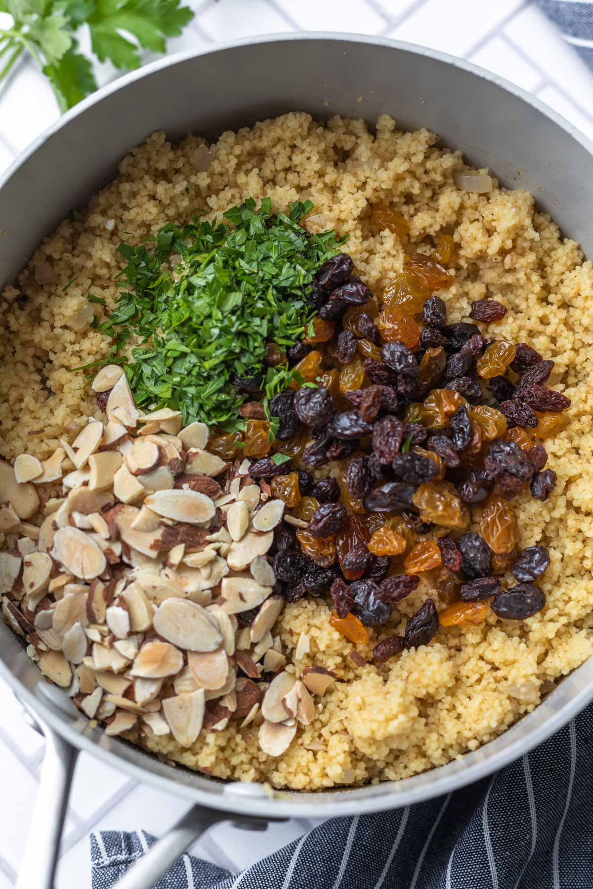Moroccan couscous ingredients in a large saucepan