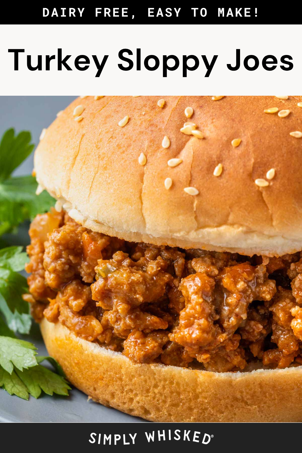 A close-up of a turkey sloppy joes sandwich on a sesame bun, garnished with parsley. The text above reads DAIRY FREE, EASY TO MAKE! and below, Turkey Sloppy Joes with SIMPLY WHISKED at the bottom.