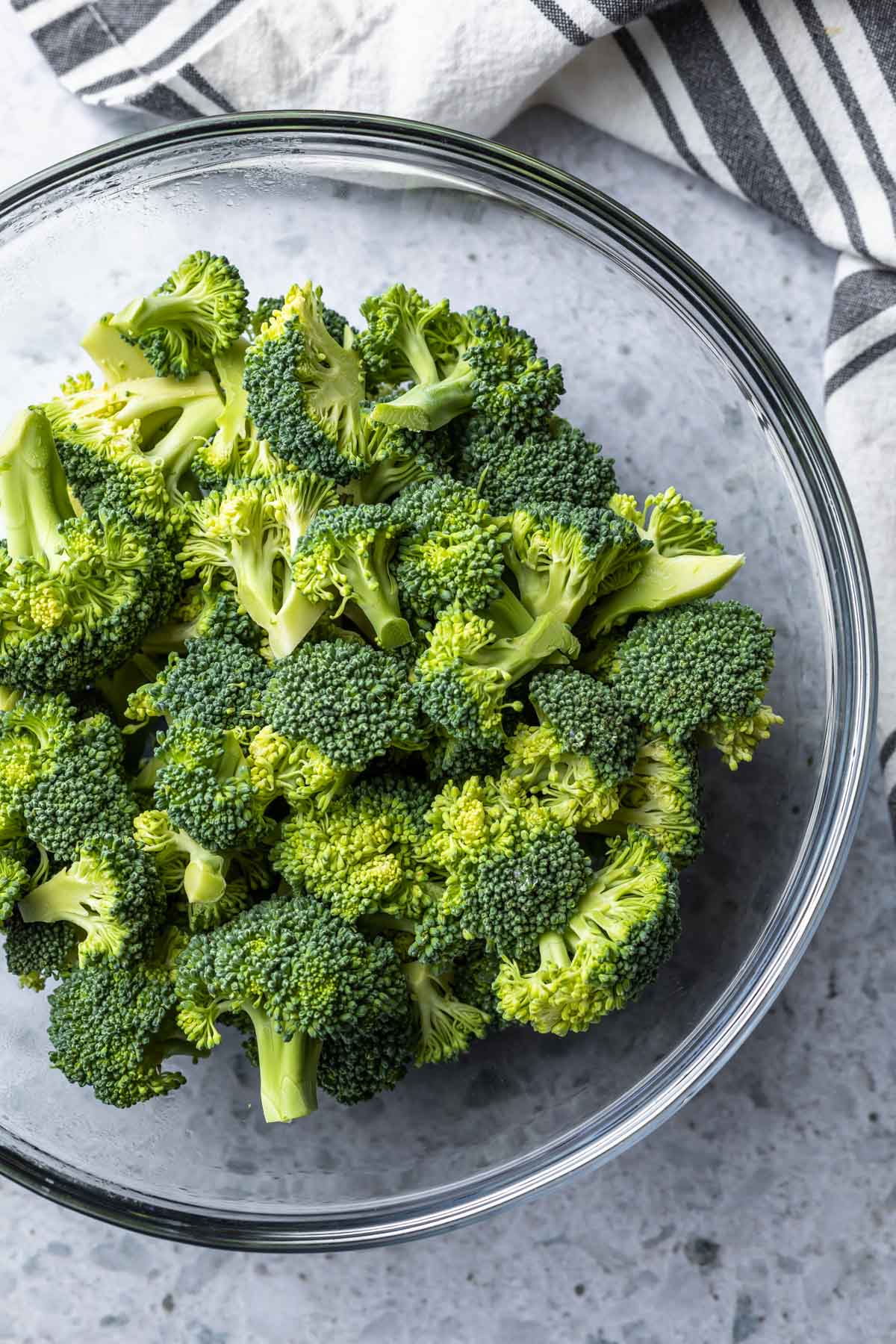 broccoli florets in a glass bowl