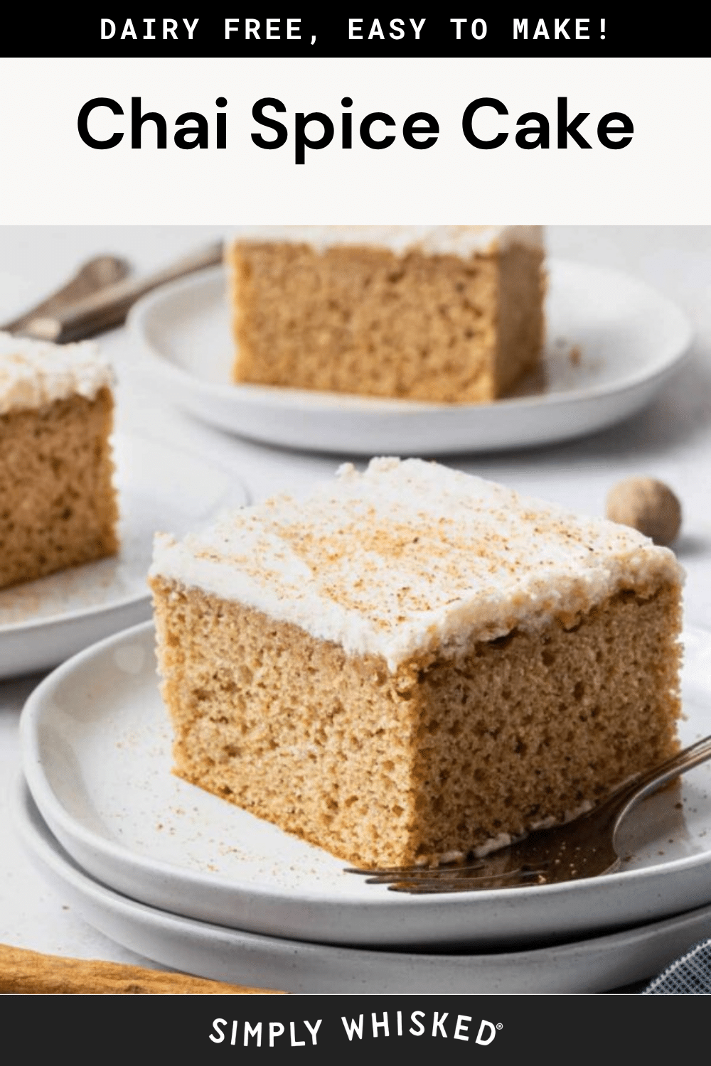 A slice of spice cake with chai flavors and white frosting sits on a white plate, with two more slices in the background. A fork and whole nutmeg are nearby. Text above reads Chai Spice Cake and Dairy Free, Easy to Make!.