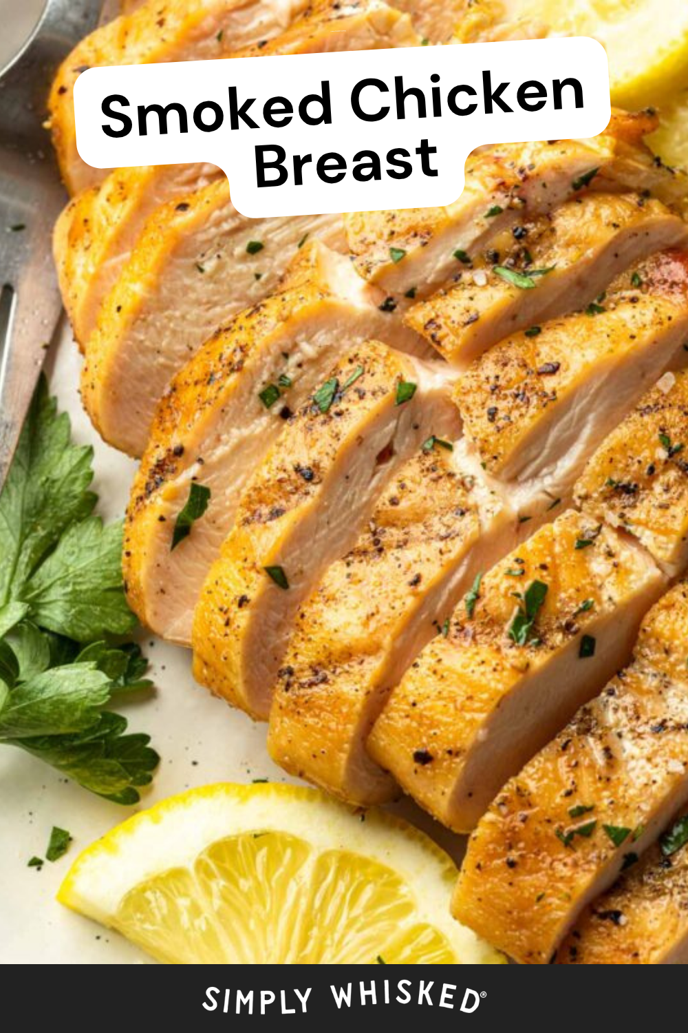 Sliced smoked chicken breast garnished with chopped herbs, served alongside lemon wedges and parsley on a white plate. Text overlay reads Smoked Chicken Breast and Simply Whisked.