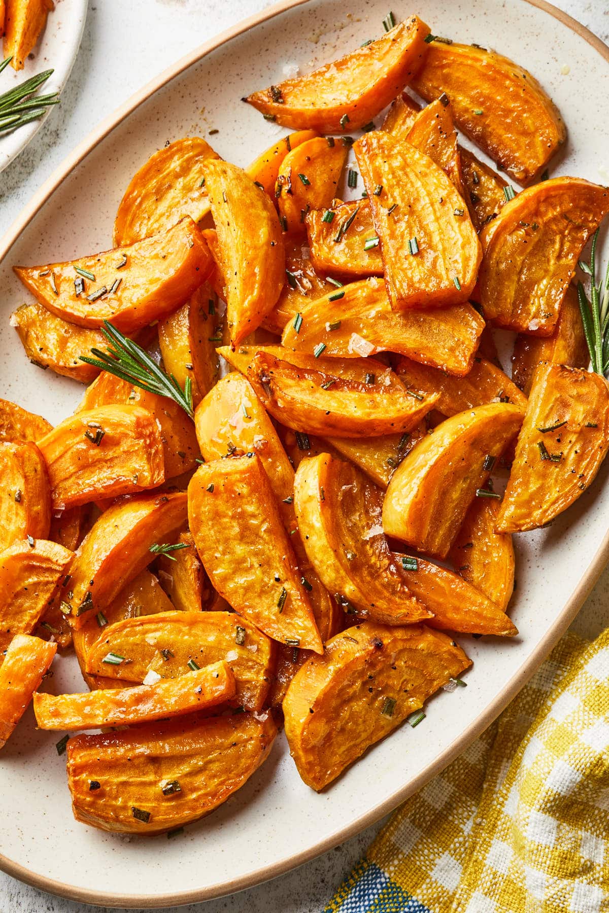 A serving platter of roasted root vegetables. 