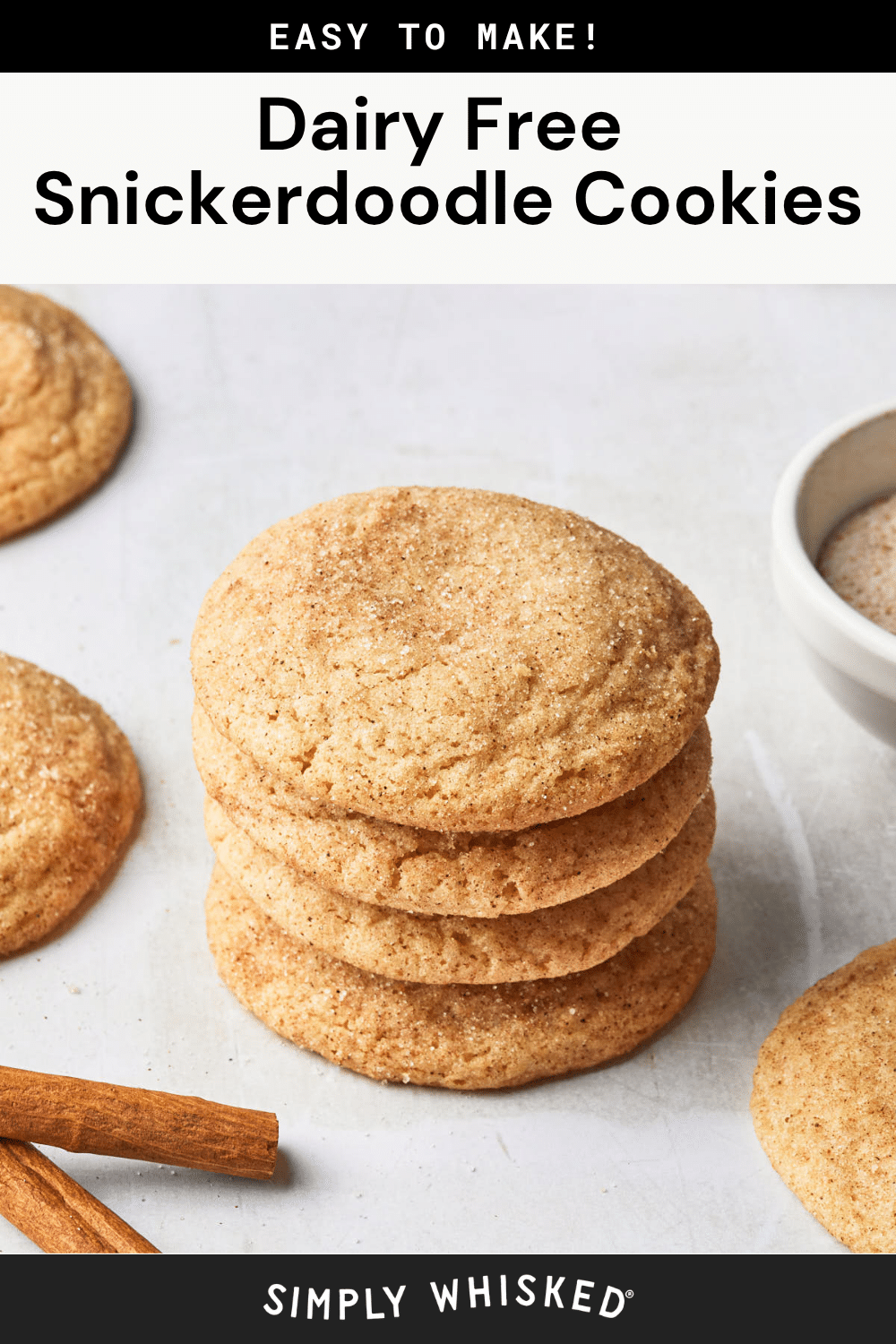A stack of four snickerdoodle cookies on a white surface, surrounded by more snickerdoodle cookies, cinnamon sticks, and a bowl of cinnamon sugar. Text reads: Dairy Free Snickerdoodle Cookies.