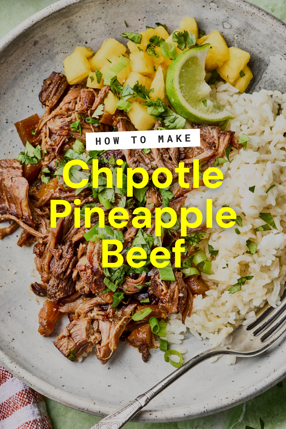 A plate with shredded pineapple beef, white rice, pineapple chunks, lime wedges, and chopped herbs sits ready with a fork on the side. Text overlay reads: How to make Chipotle Pineapple Beef.