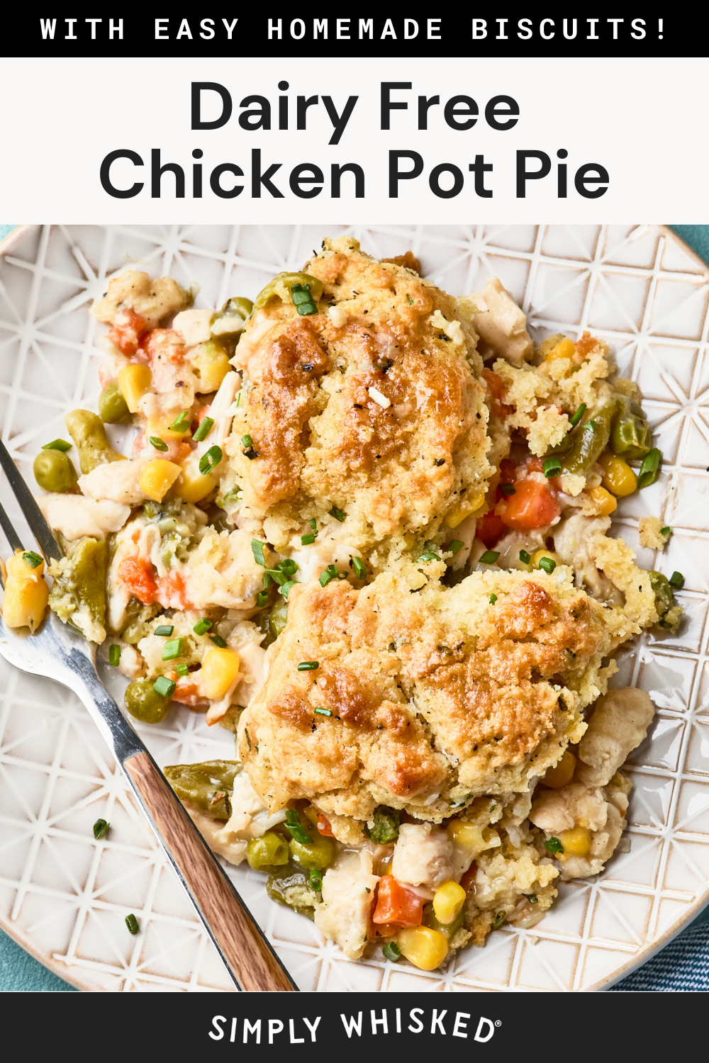 A plate with easy chicken pot pie with biscuits, topped with golden biscuits and filled with chicken, peas, carrots, and corn. A fork rests on the plate. Text above reads, Dairy Free Chicken Pot Pie and Simply Whisked.
