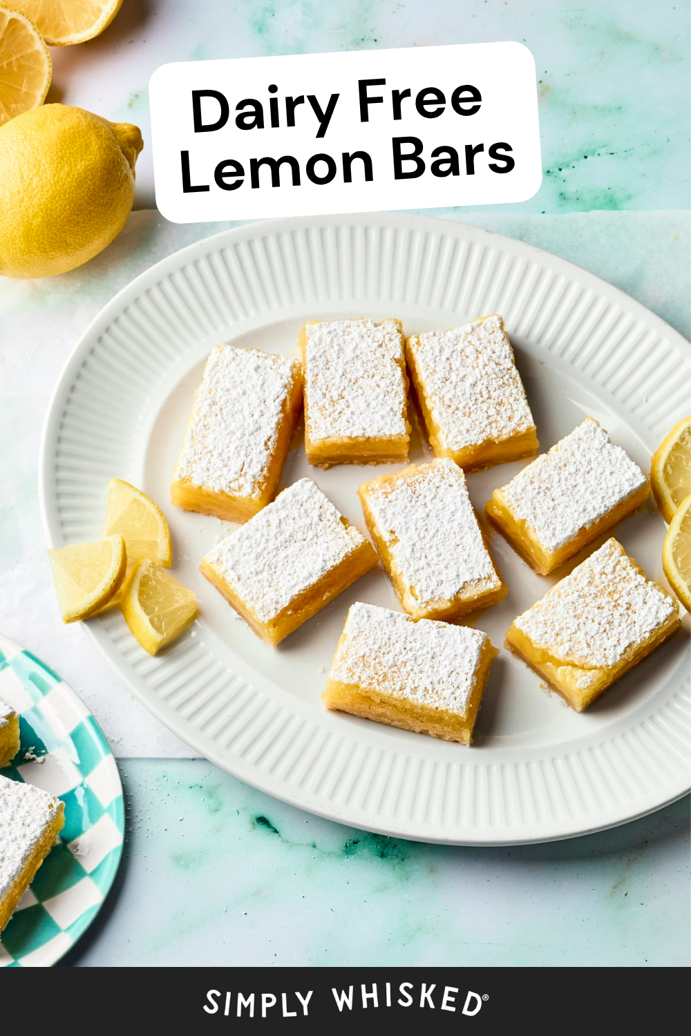 A white platter with dairy free lemon bars dusted with powdered sugar, surrounded by fresh lemon wedges. A sign reads Dairy Free Lemon Bars, highlighting these delightful treats, and the image is branded Simply Whisked at the bottom.
