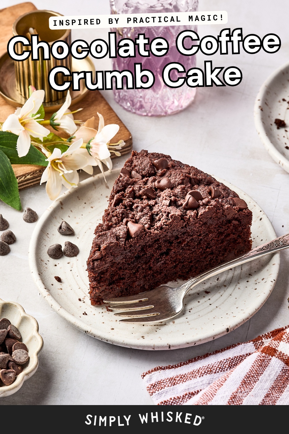 A slice of chocolate coffee crumb cake with chocolate chips on a plate, a fork beside it, flowers, and extra chocolate chips around; text reads Chocolate Coffee Crumb Cake..